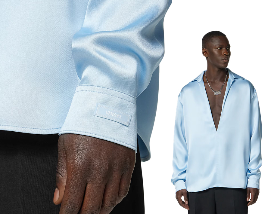 Versace's Men's runway silk-blend blue shirt with a logo appliqué on the sleeve wore by a Black male model.