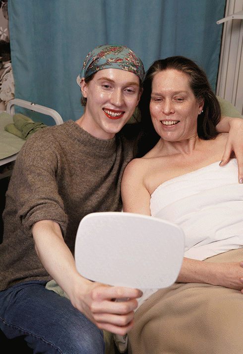 Esthetician Liam hugging his mother after a skincare treatment at a Vancouver medical spa