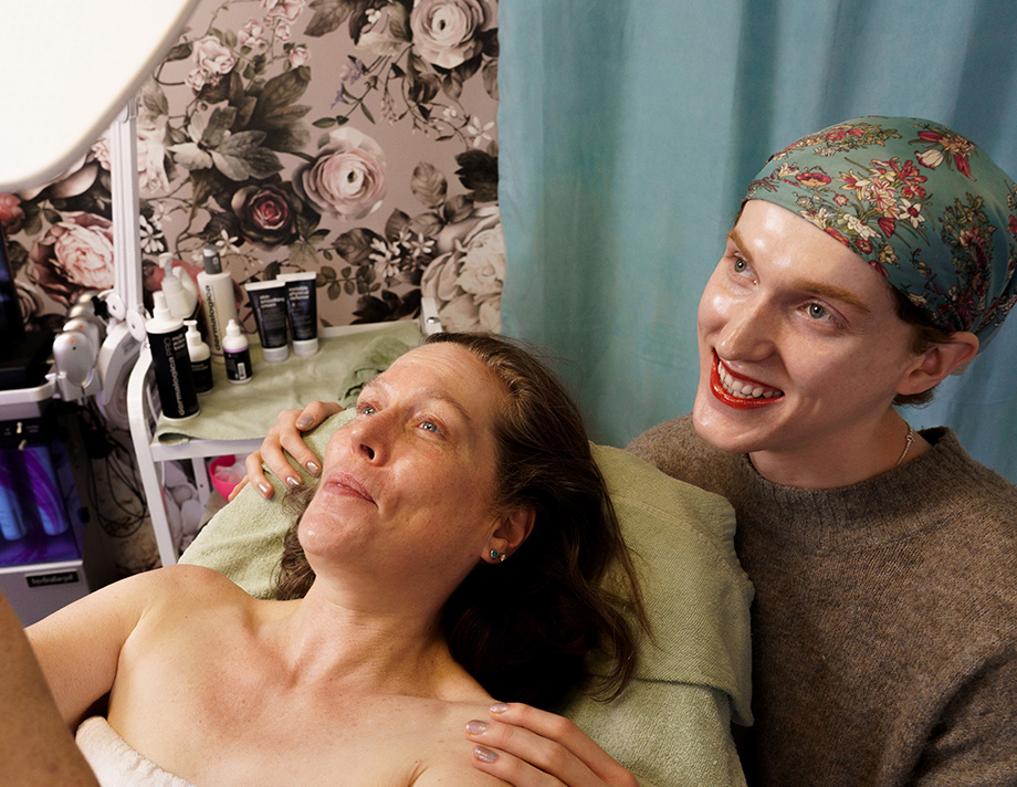 Esthetician Liam finishing a facial treatment at a Vancouver medical spa